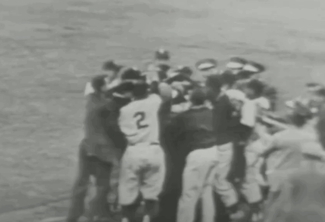 Image of Don Larsen pitching during his perfect game in the 1956 World Series, a highlight in baseball's greatest plot twi...